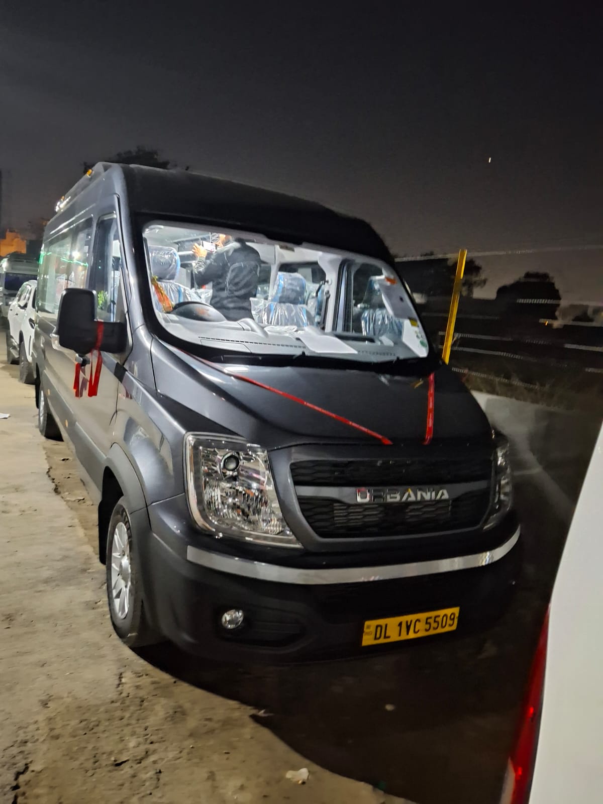 Urbania On Rent team providing luxury Urbania vans for travel in Delhi with comfort and professionalism