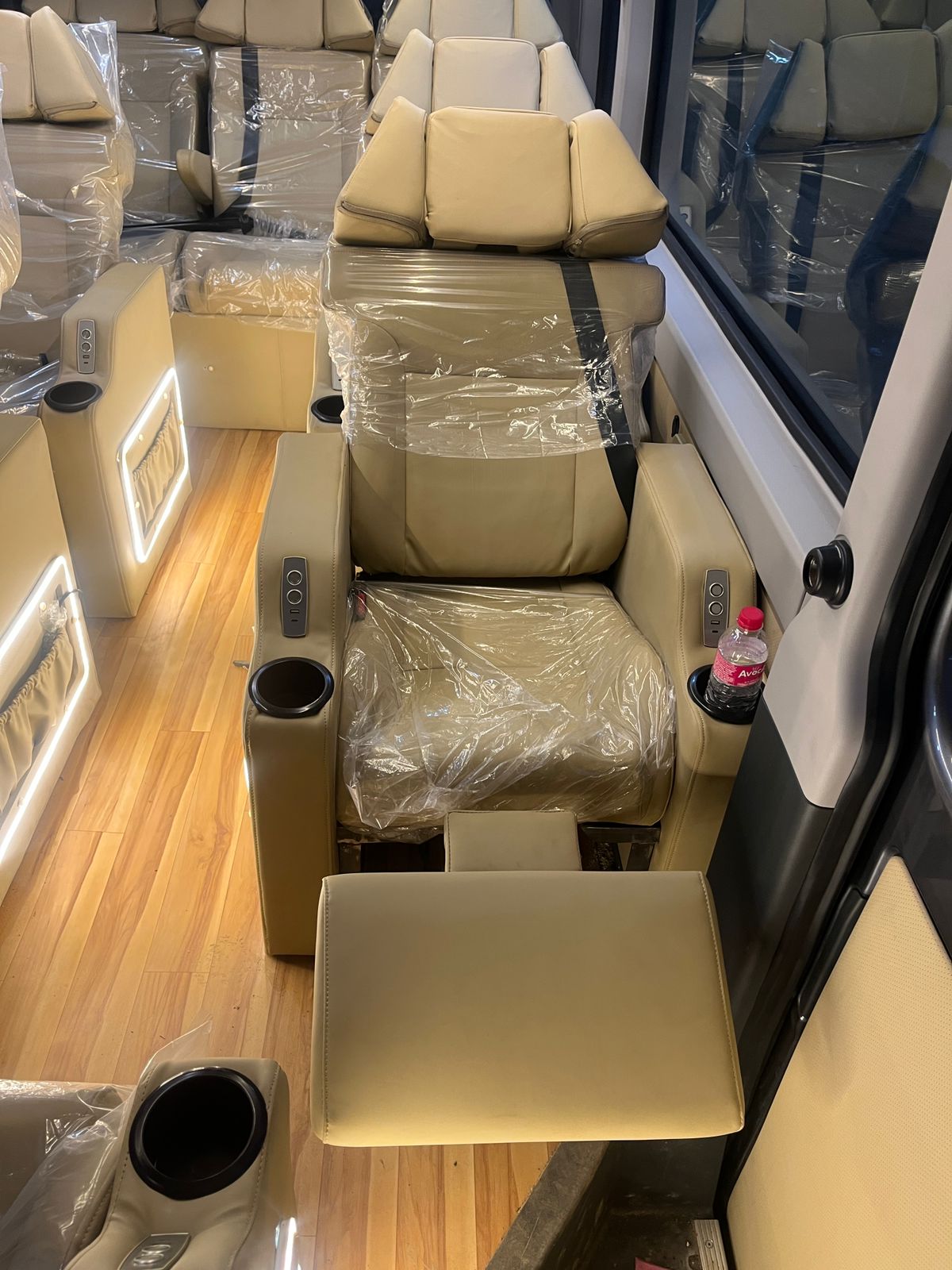 Spacious interior of Urbania luxury van with premium seating and AC comfort for smooth travel